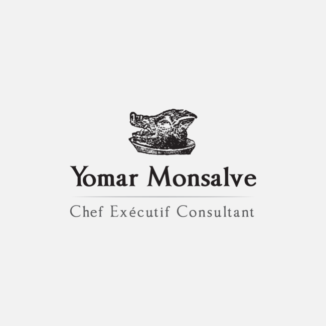 Logo for Yomar Monsalve, designed by Imago Visual, featuring a classical woodcut-style boar’s head on a platter, representing his Venezuelan heritage and Parisian culinary artistry.